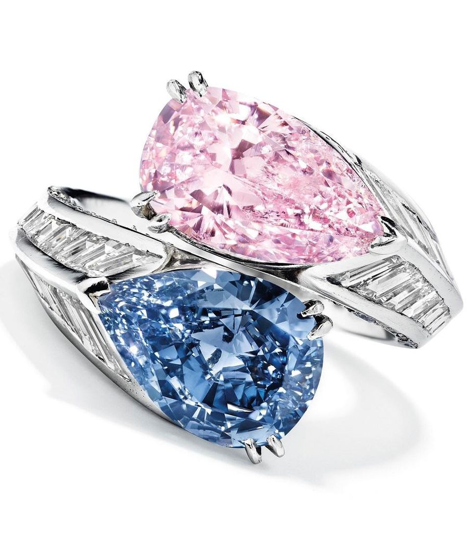 A pear-cut fancy intense pink diamond and vivid blue diamond ring.