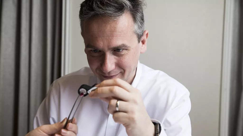 Rio Tinto CEO Jean-Sebastien Jacques inspects the Argyle Muse Diamond.