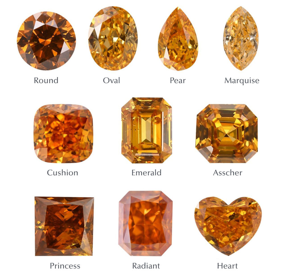 A selection of orange diamonds isolated on a white background.