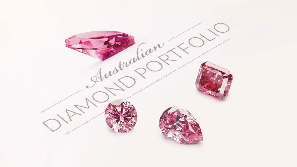 Three pink diamonds resting on the Australian Diamond Portfolio logo.